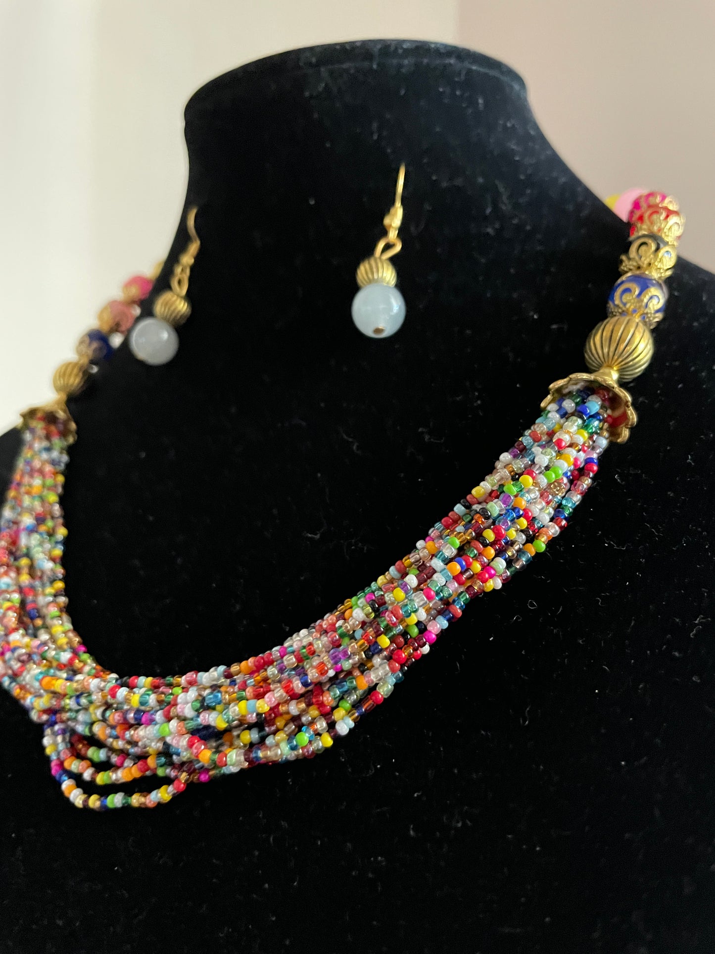 Handcrafted multilayered bead necklace earrings set