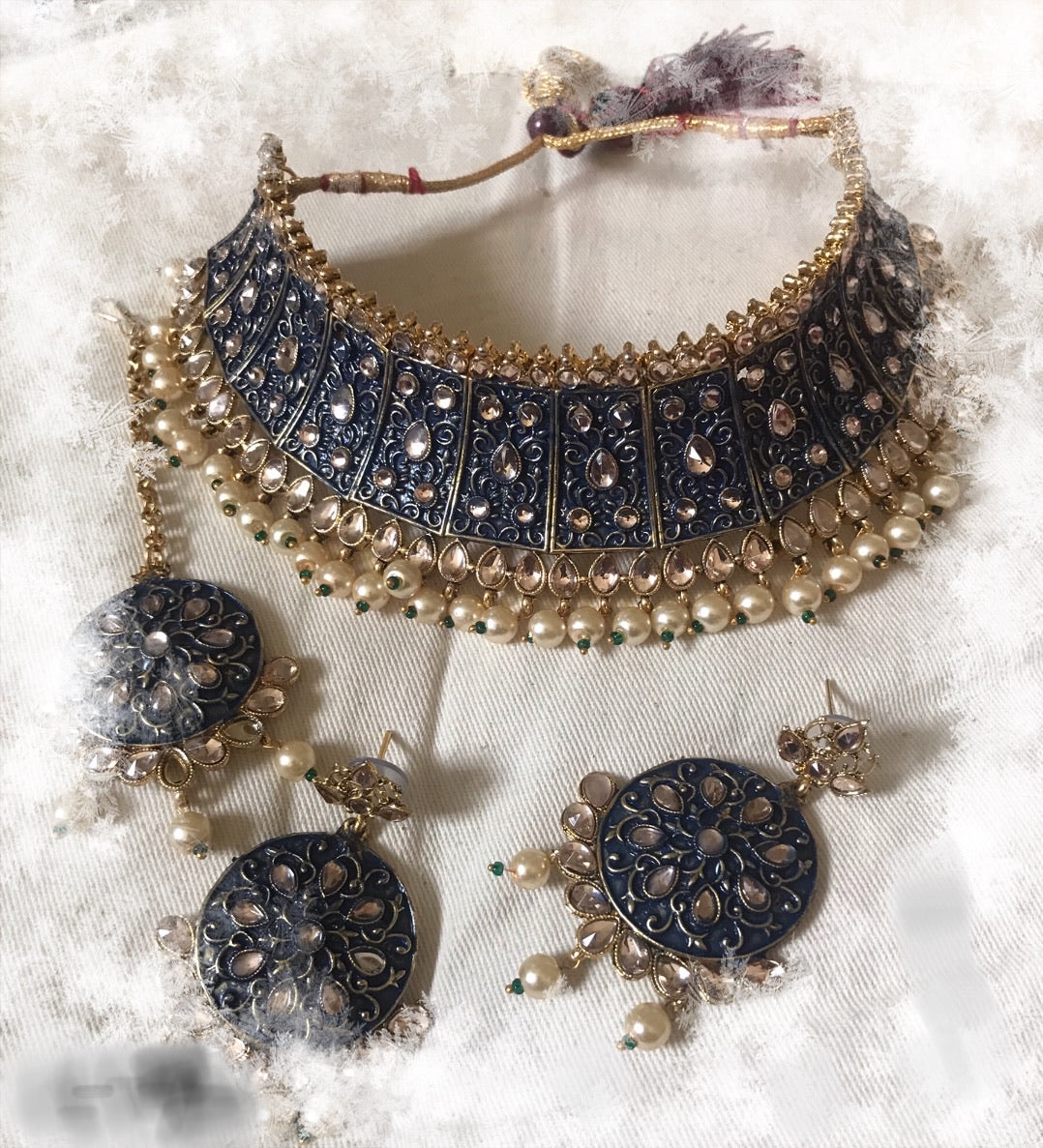 Indian bridal necklace earrings and teeka head jewelry set
