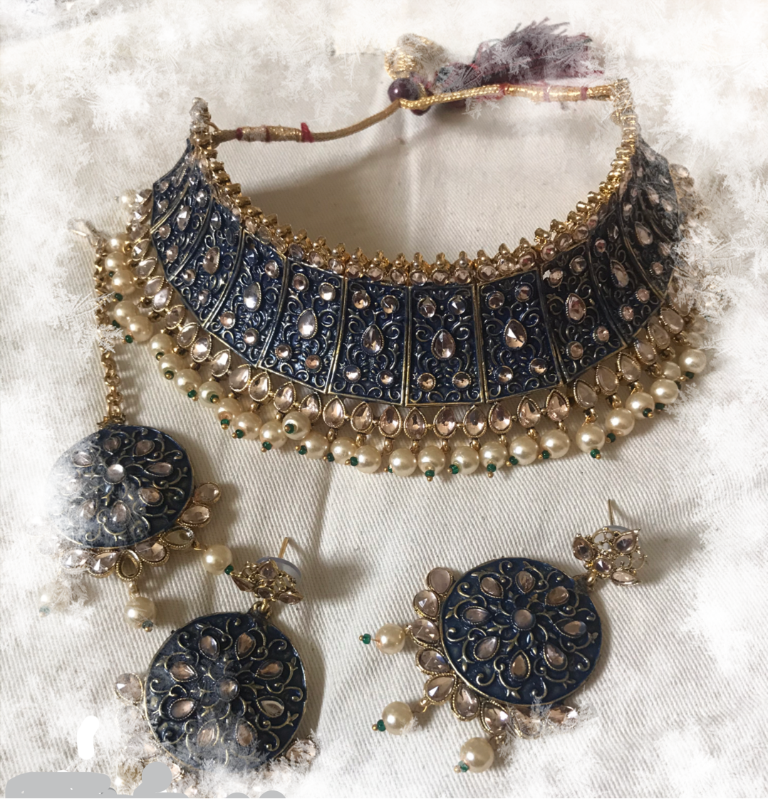 Indian bridal necklace earrings and teeka head jewelry set